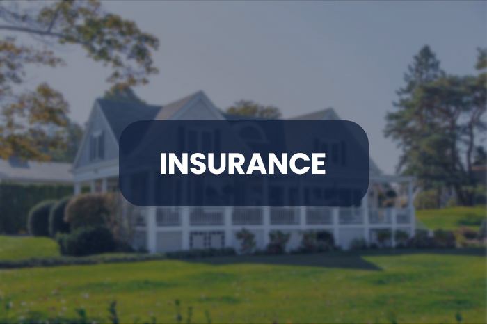 Large building in a green area representing one of our business sectors, insurance.